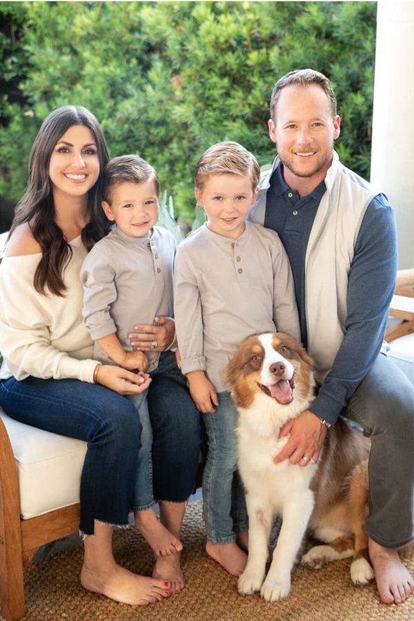 Photo of family with dog in home